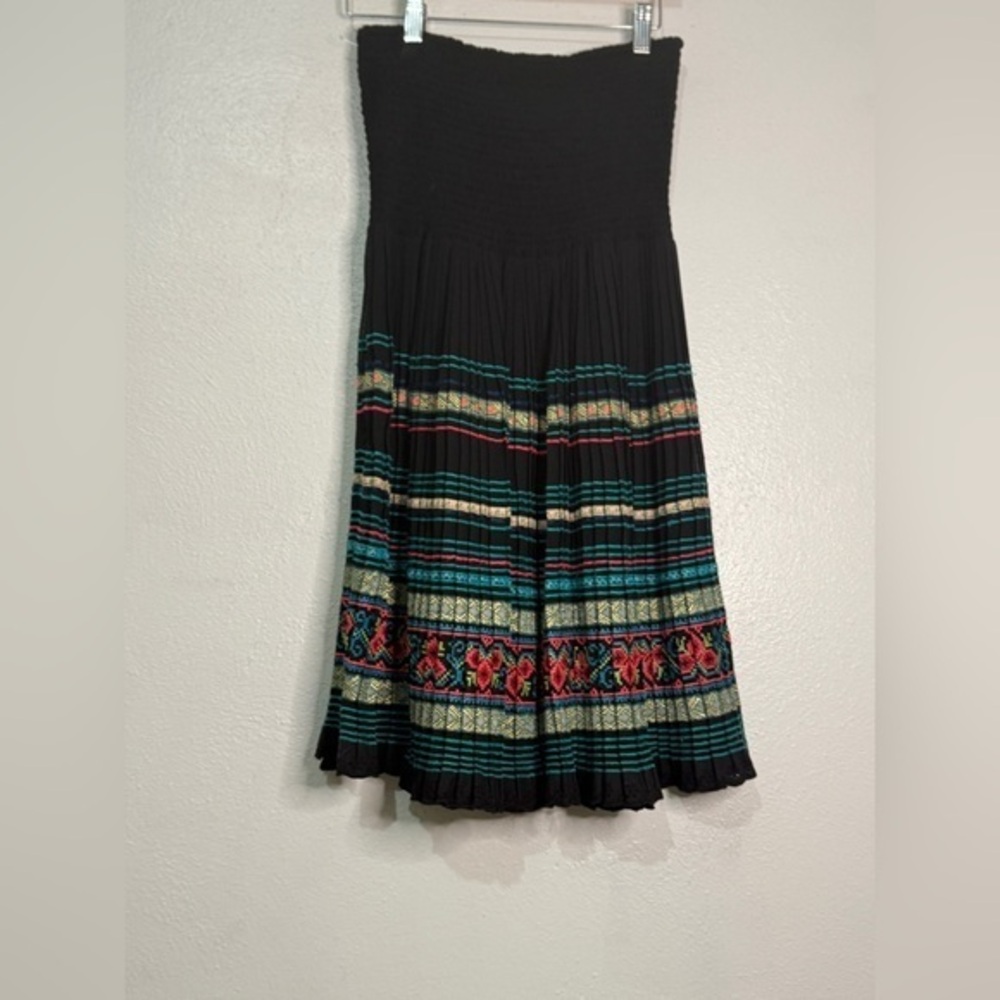 Free People black pleated skirt with colorful embellished hem. Size S. NWOT.